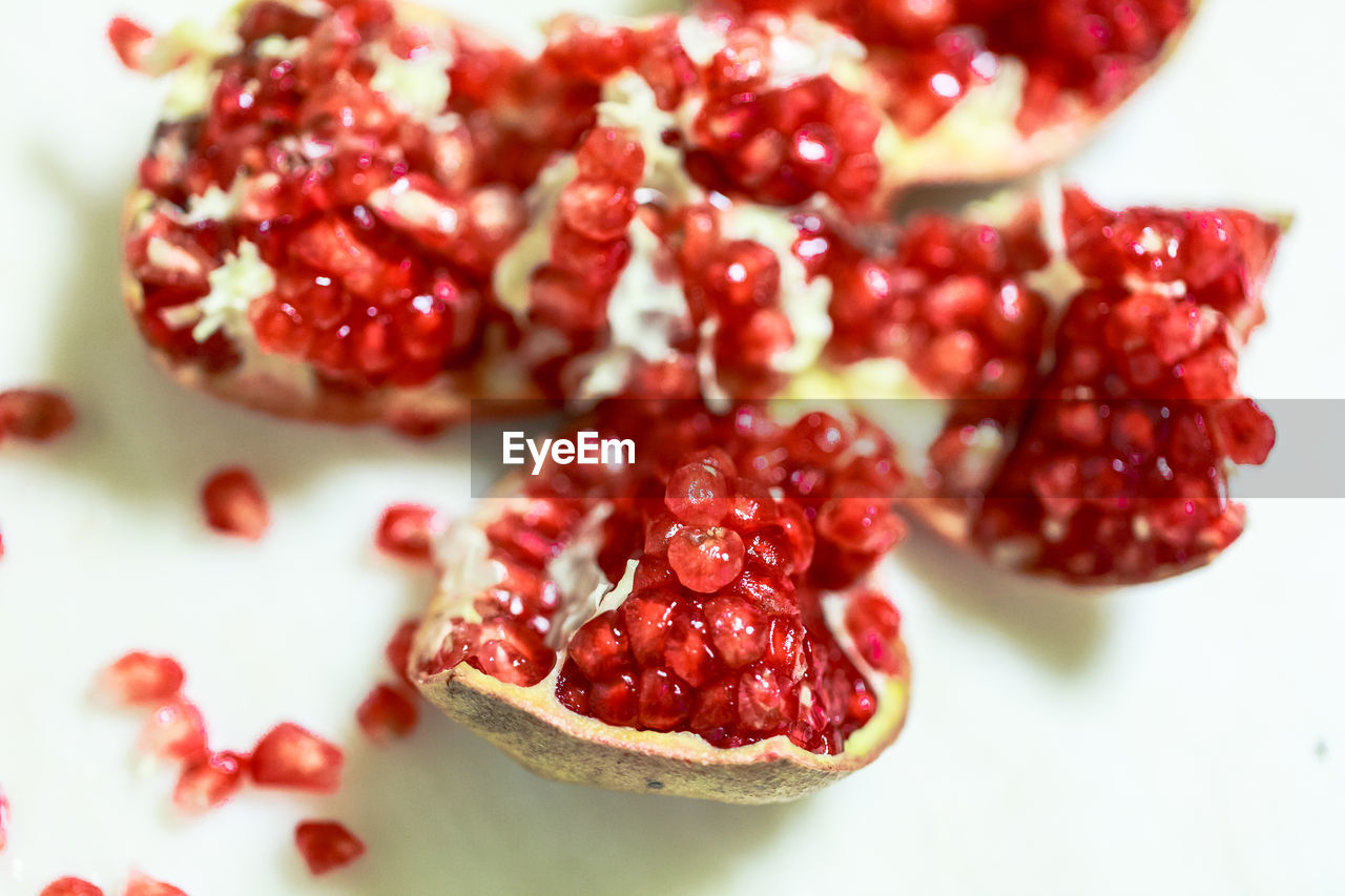 food and drink, pomegranate, food, fruit, plant, healthy eating, red, wellbeing, pomegranate seed, seed, freshness, berry, produce, no people, berries, close-up, studio shot, sweet food, cranberry, indoors, antioxidant, juicy, ripe