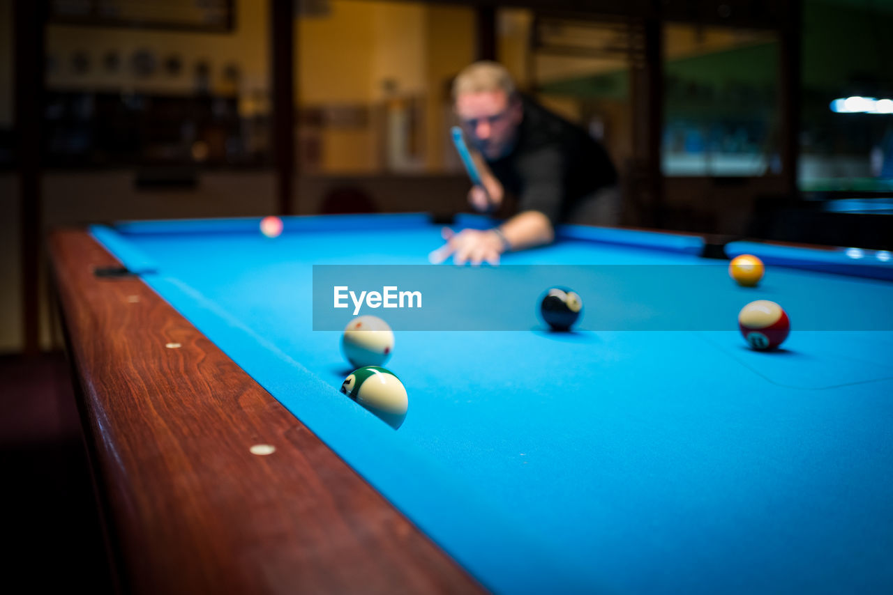 Man playing snooker