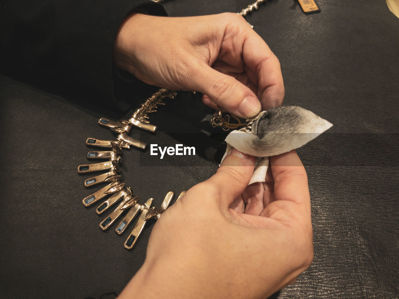 Silver jewelry cleaning with cloth