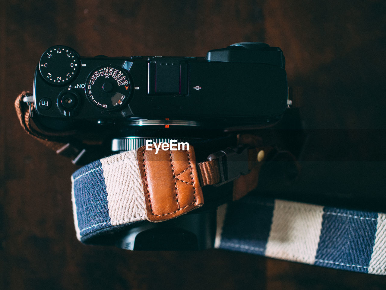 Close-up of camera on table