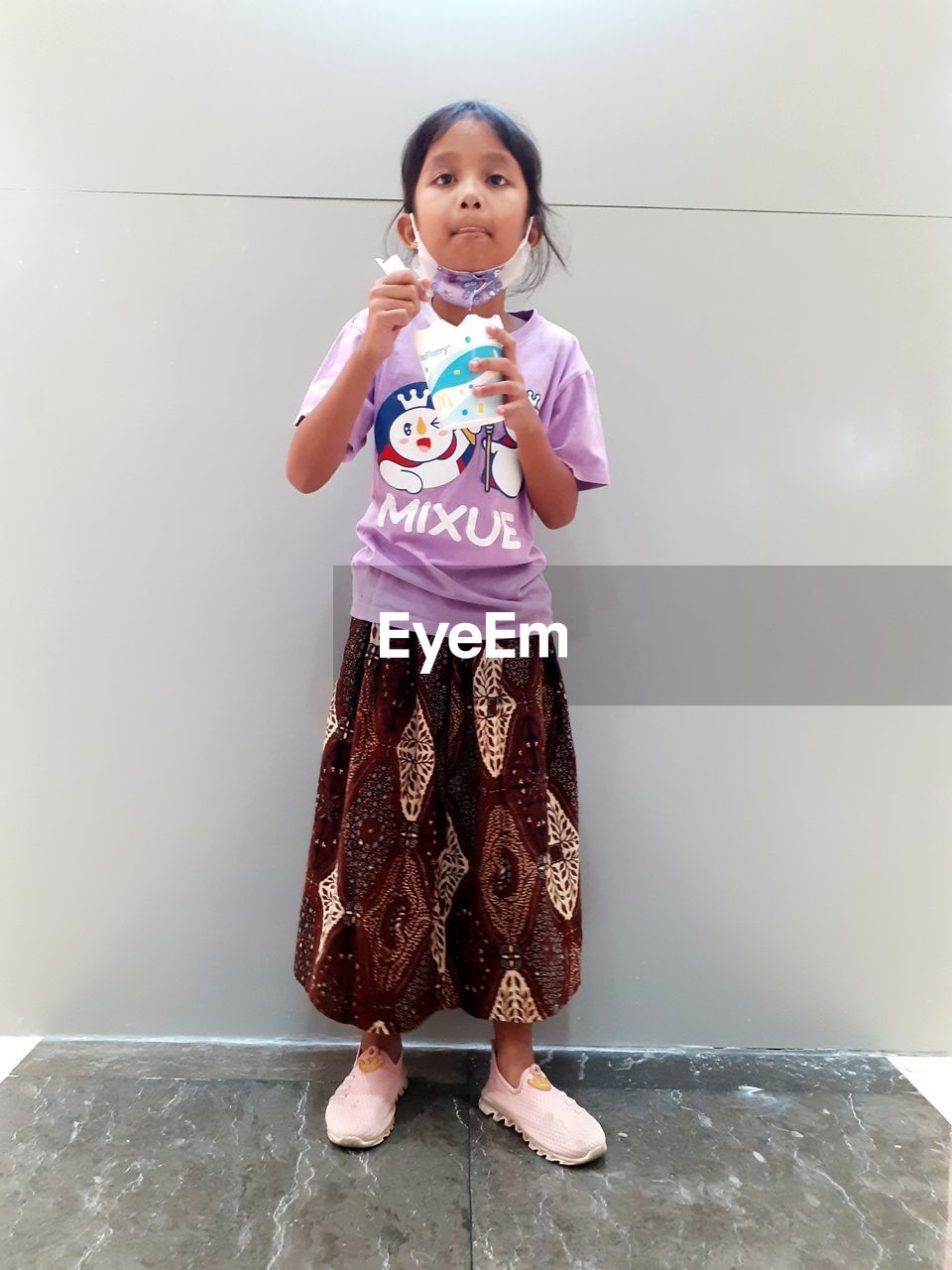 childhood, child, one person, full length, women, female, standing, toddler, indoors, portrait, front view, clothing, cute, looking at camera, person, smiling, innocence, footwear, emotion, lifestyles, happiness, casual clothing, baby, skirt, dress, photo shoot, pink, holding, copy space, human face