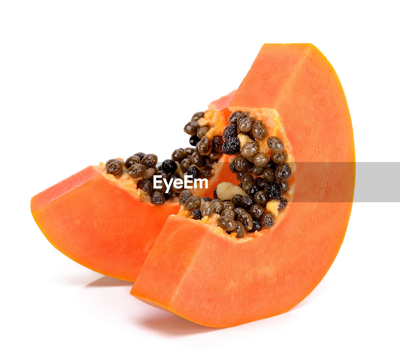 Close-up of papaya against white background