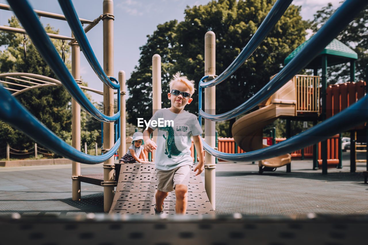 BOY PLAYING IN PARK