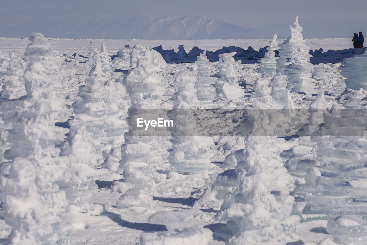 Snow on mountain against sky