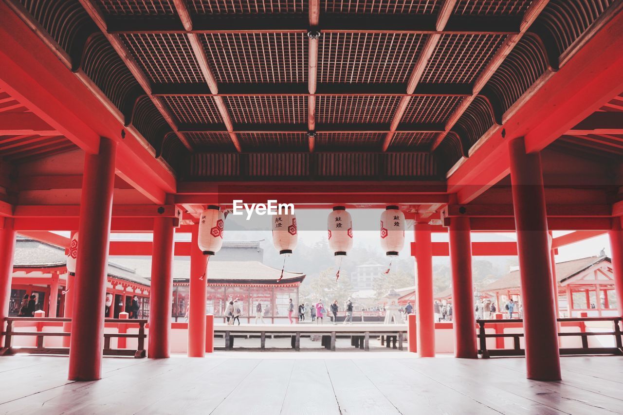 Lanterns hanging from roof of japanese temple