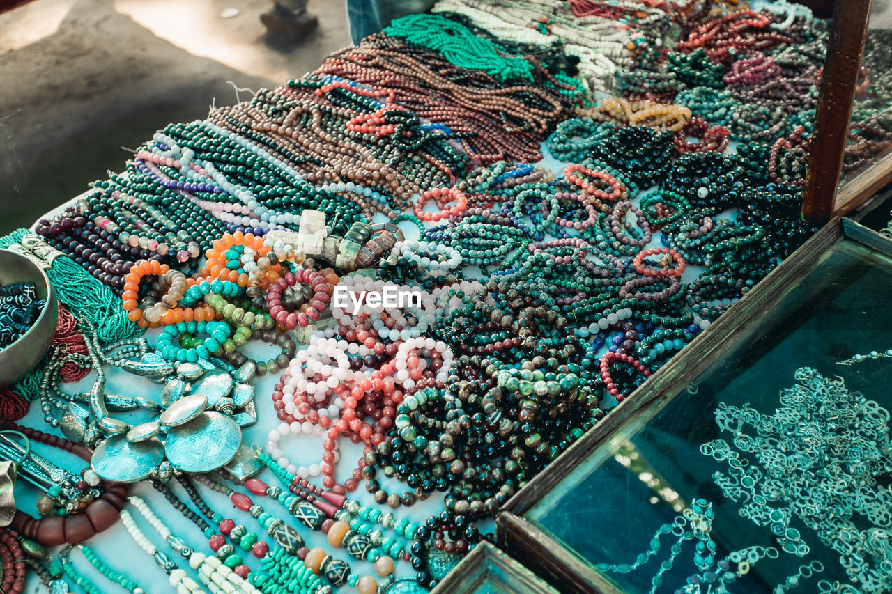 Close-up high angle view of multi colored bracelets