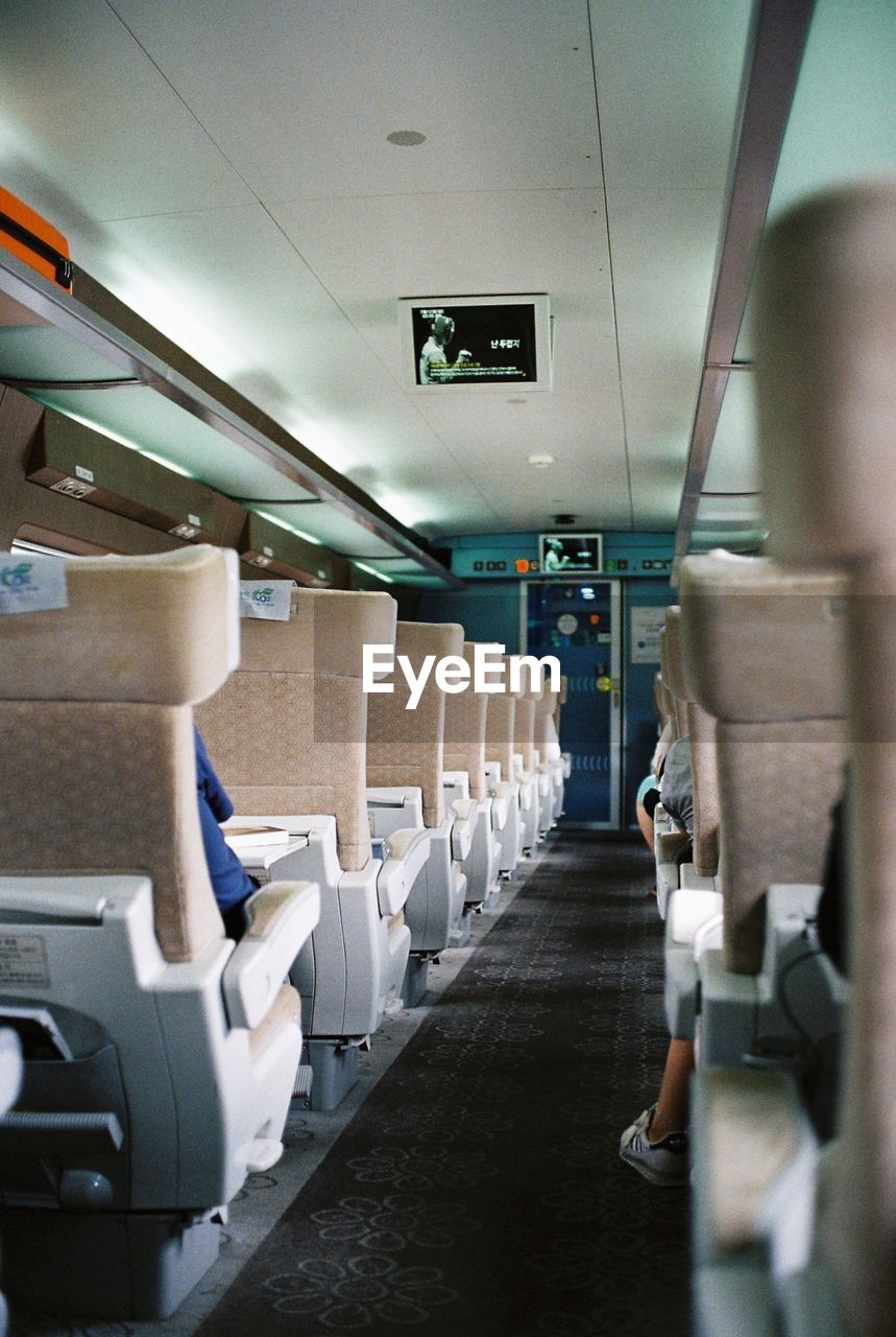 WOMAN TRAVELING IN TRAIN
