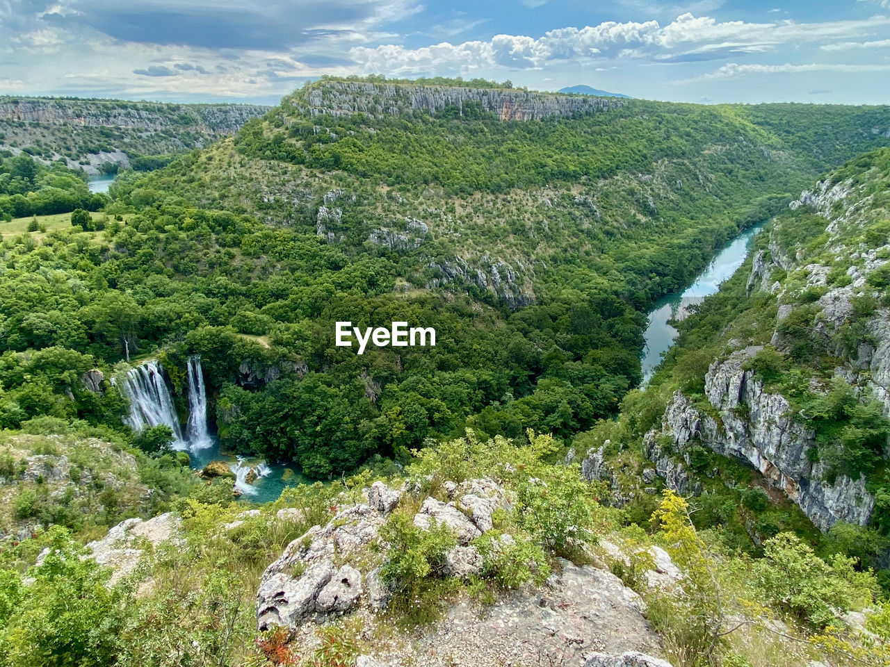 SCENIC VIEW OF WATERFALL