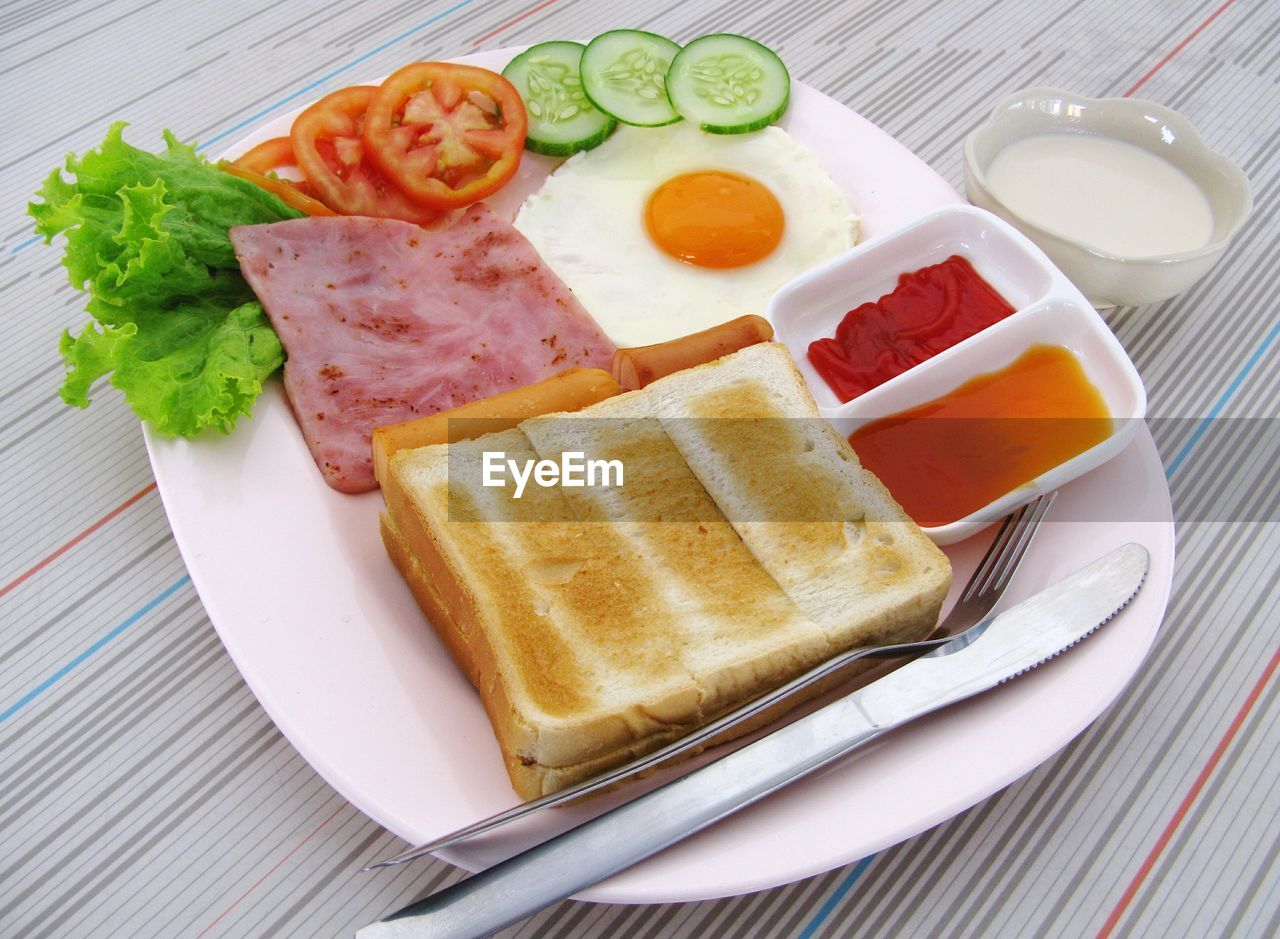 Close-up of breakfast served in plate