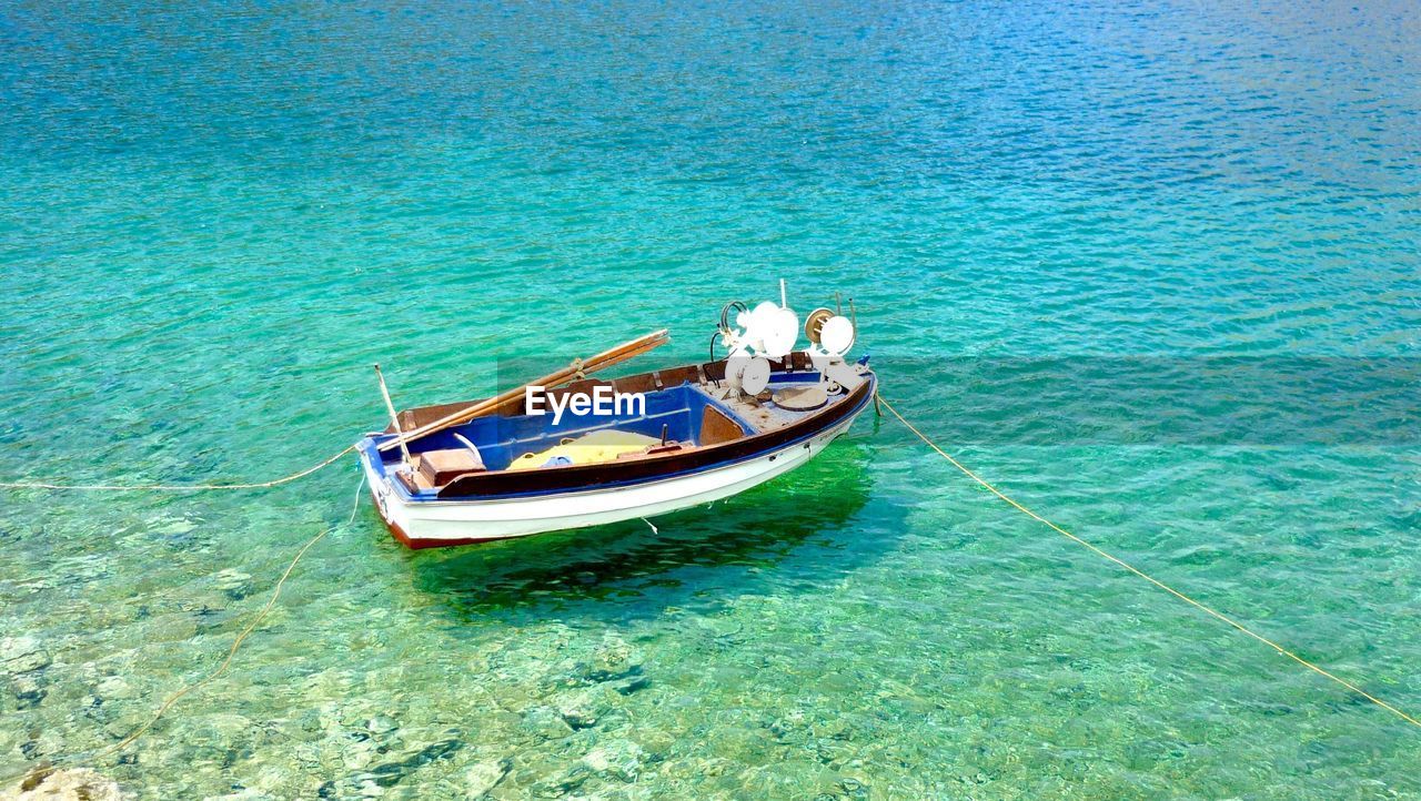 High angle view of boat sailing in sea