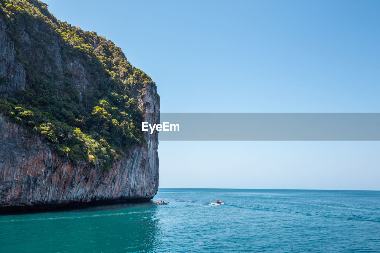 SCENIC VIEW OF SEA AGAINST BLUE SKY