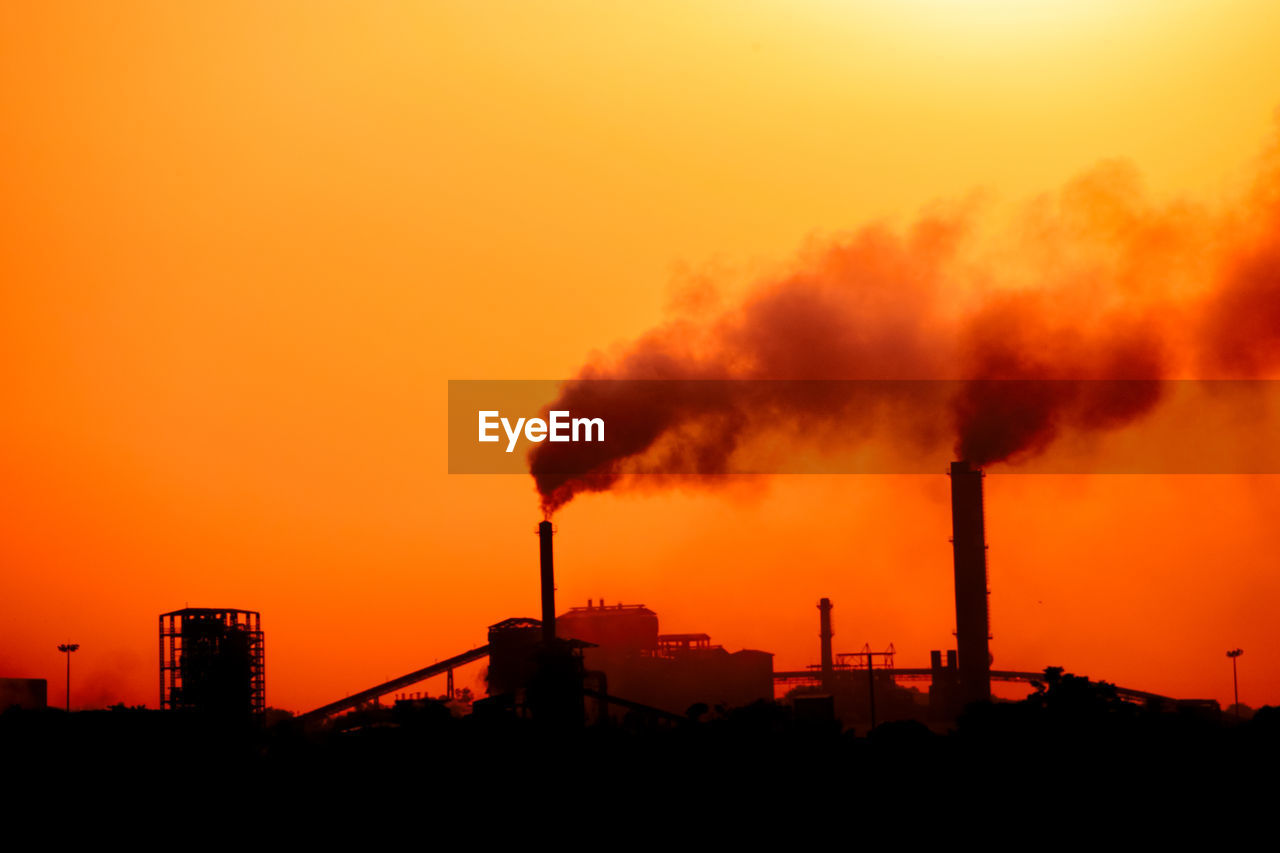 view of city against sky during sunset