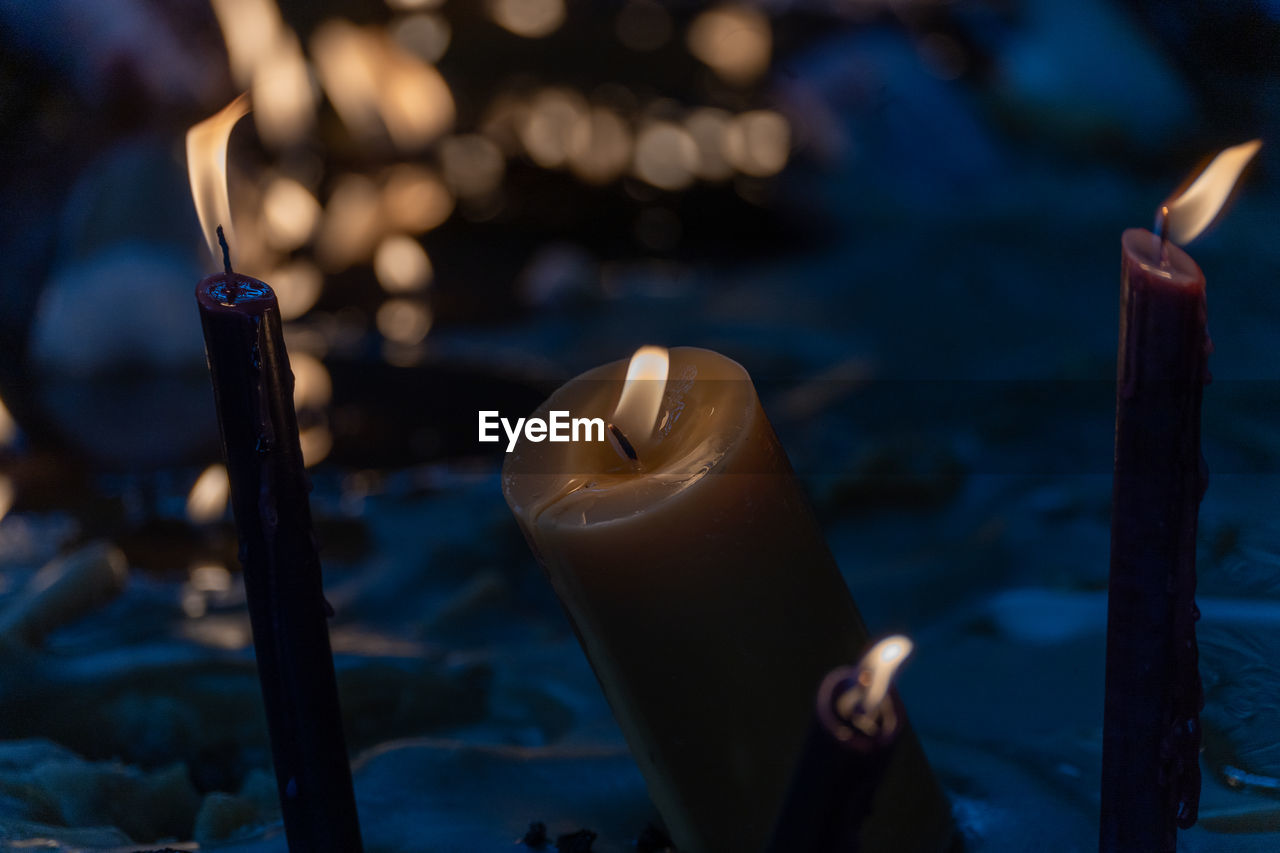 Close-up of illuminated candle