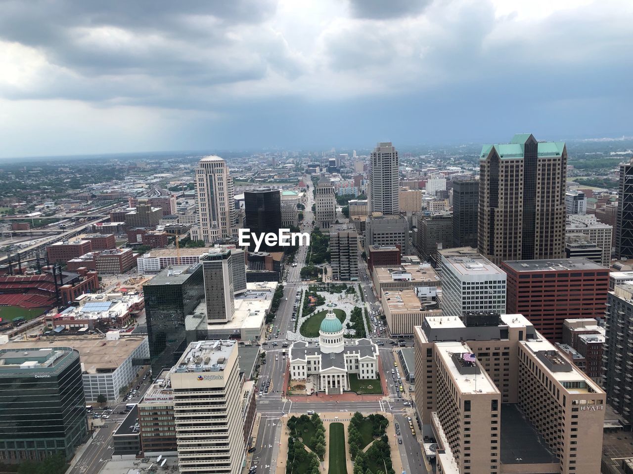 High angle view of modern buildings in city against sky