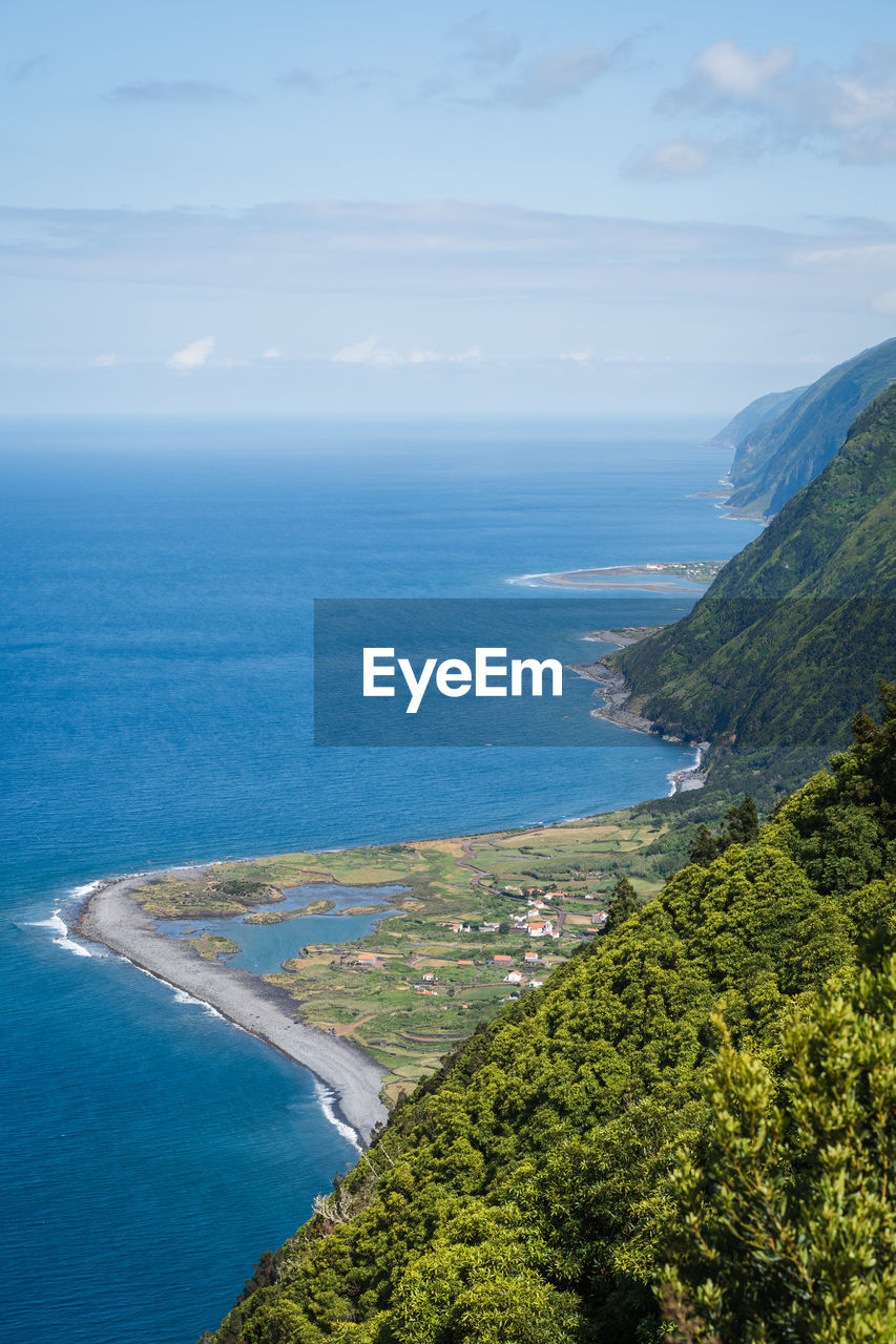 High angle view of bay against sky