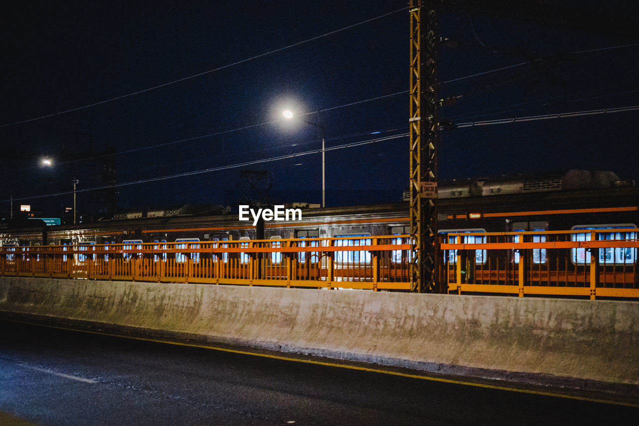 RAILROAD STATION PLATFORM AT NIGHT