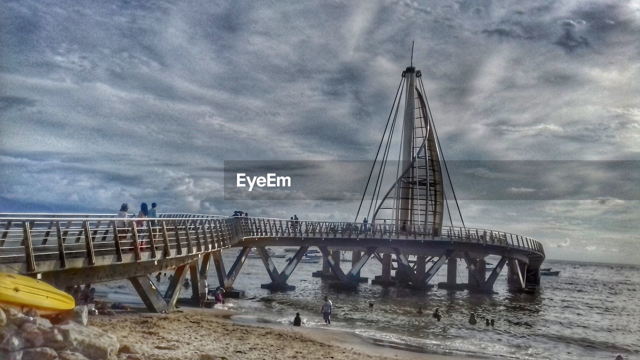 BRIDGE OVER SEA AGAINST SKY