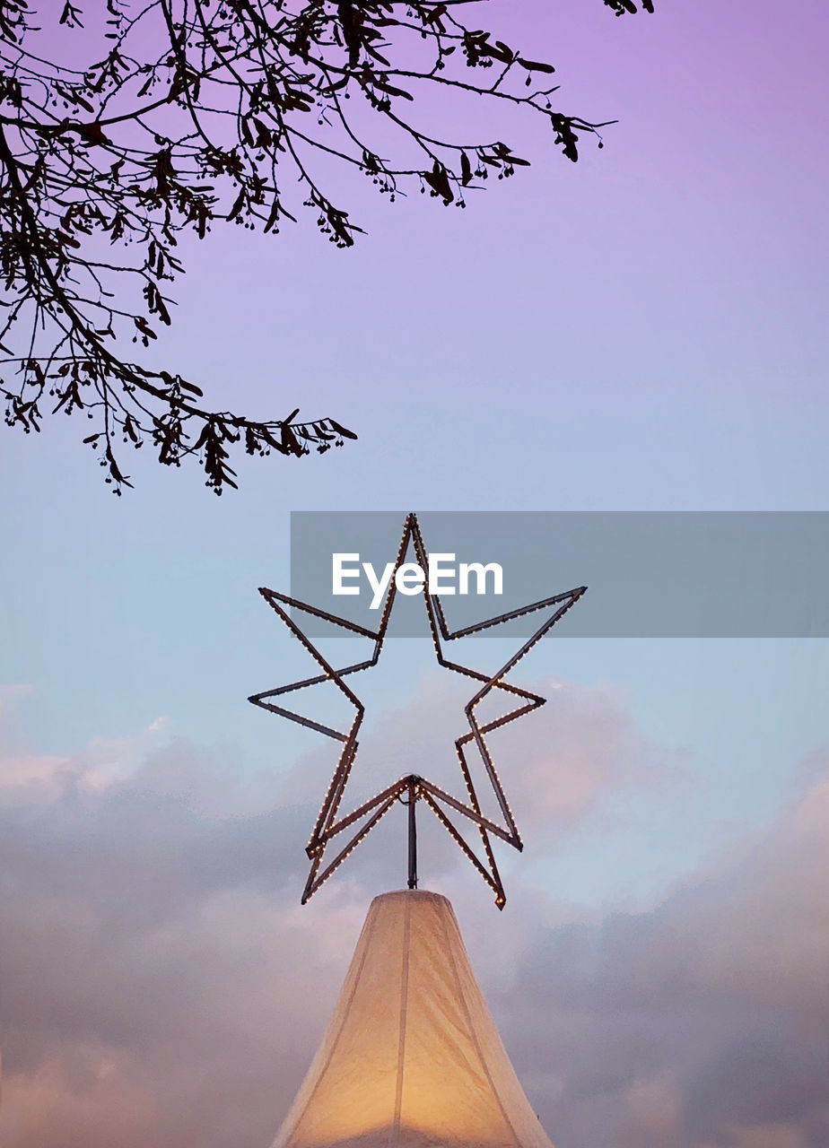 LOW ANGLE VIEW OF WIND TURBINE AGAINST SKY