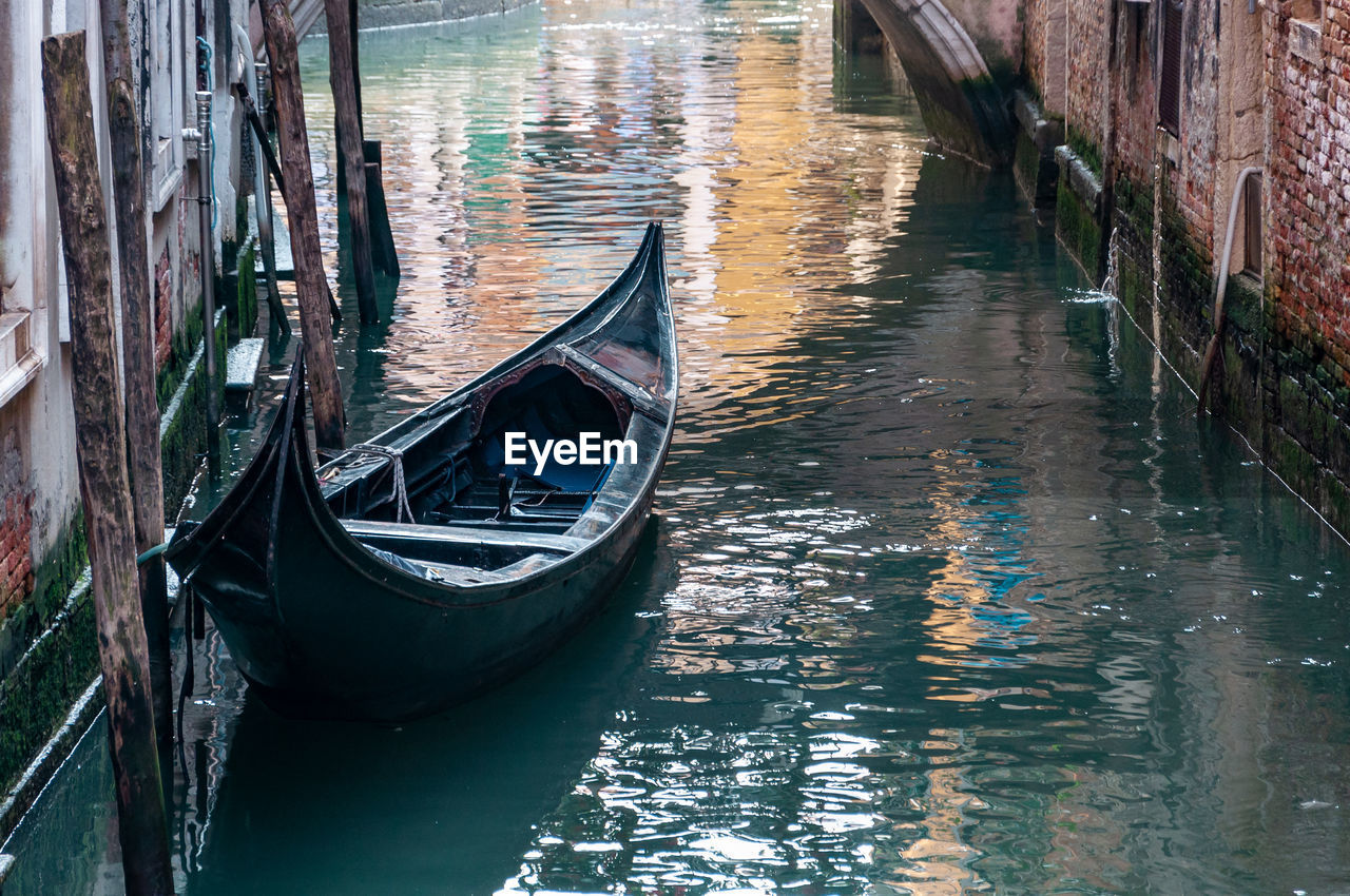 BOATS MOORED AT CANAL