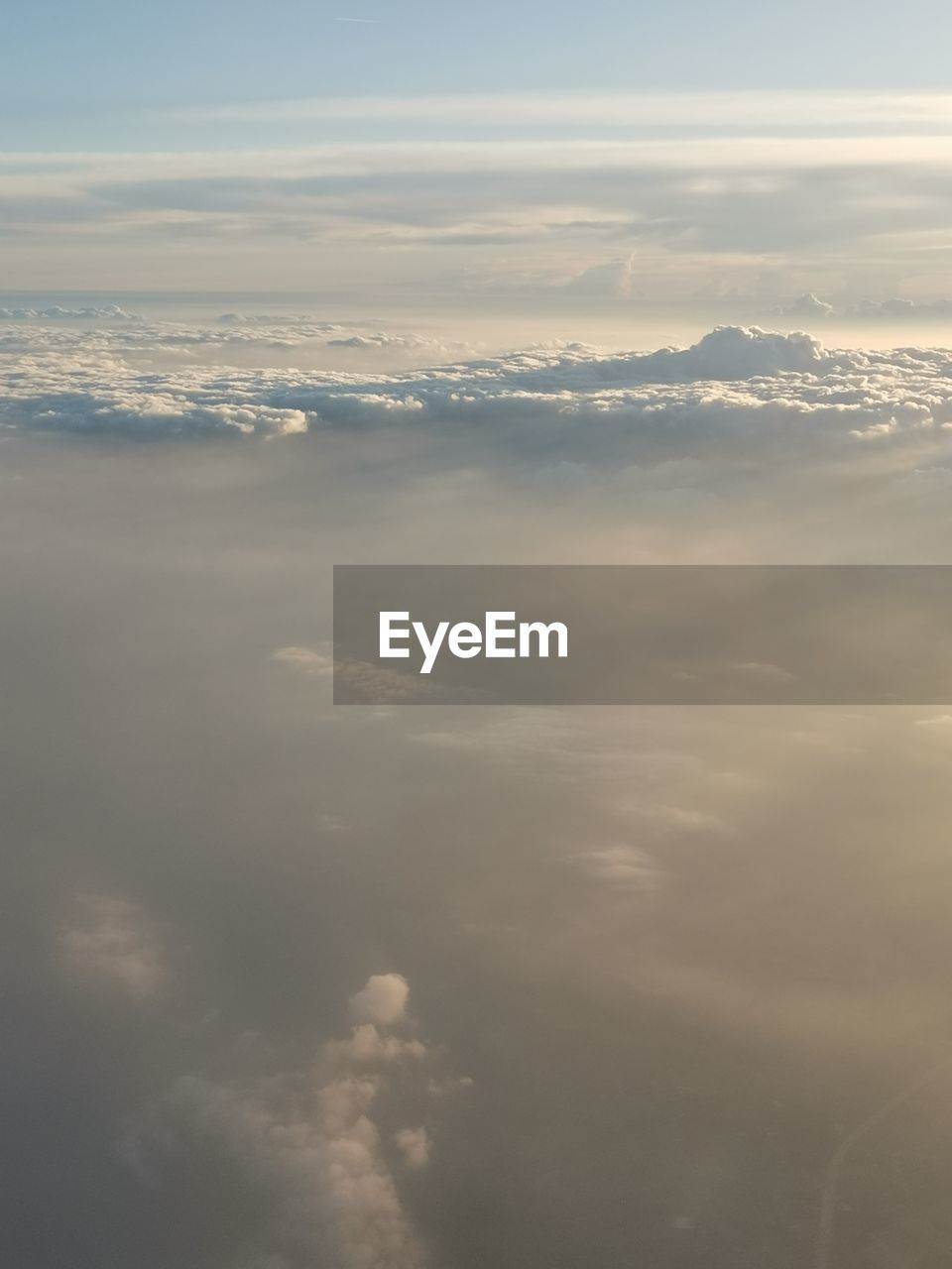 Aerial view of sea against sky during sunset