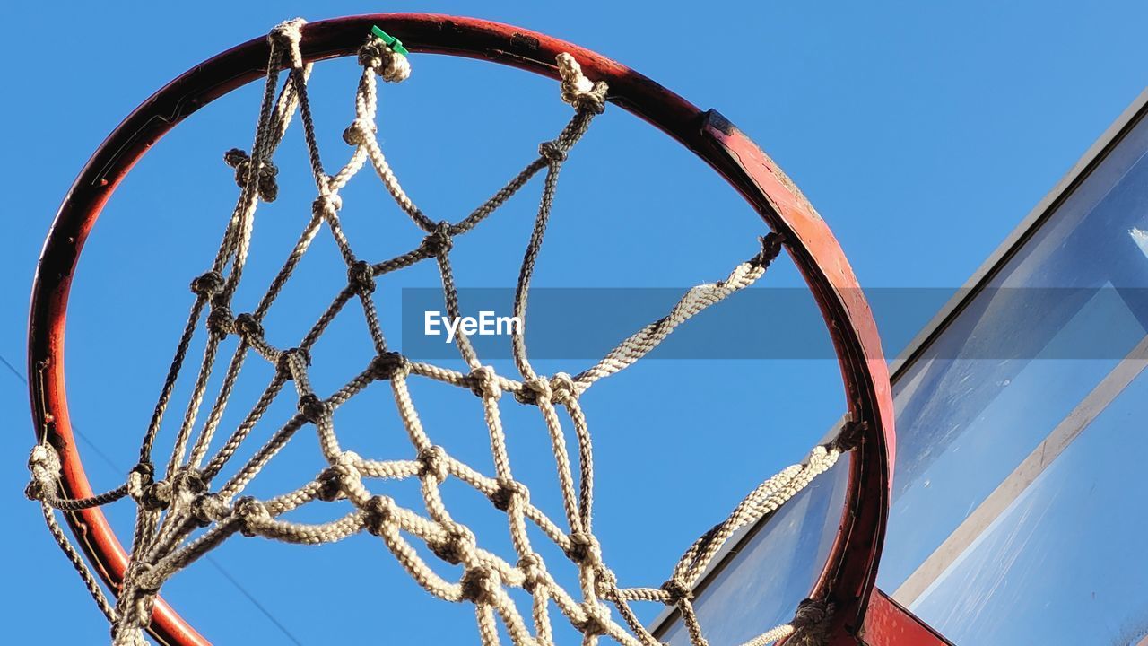 LOW ANGLE VIEW OF METAL AGAINST BLUE SKY