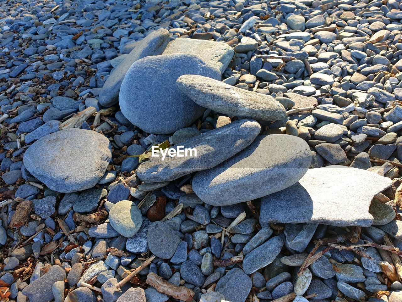 High angle view of stones on beach