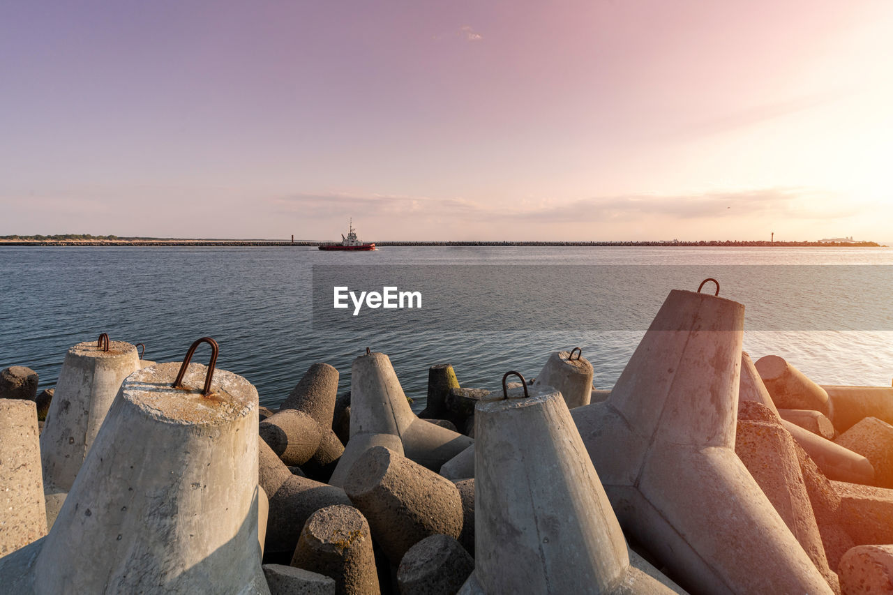 SCENIC VIEW OF SEA DURING SUNSET