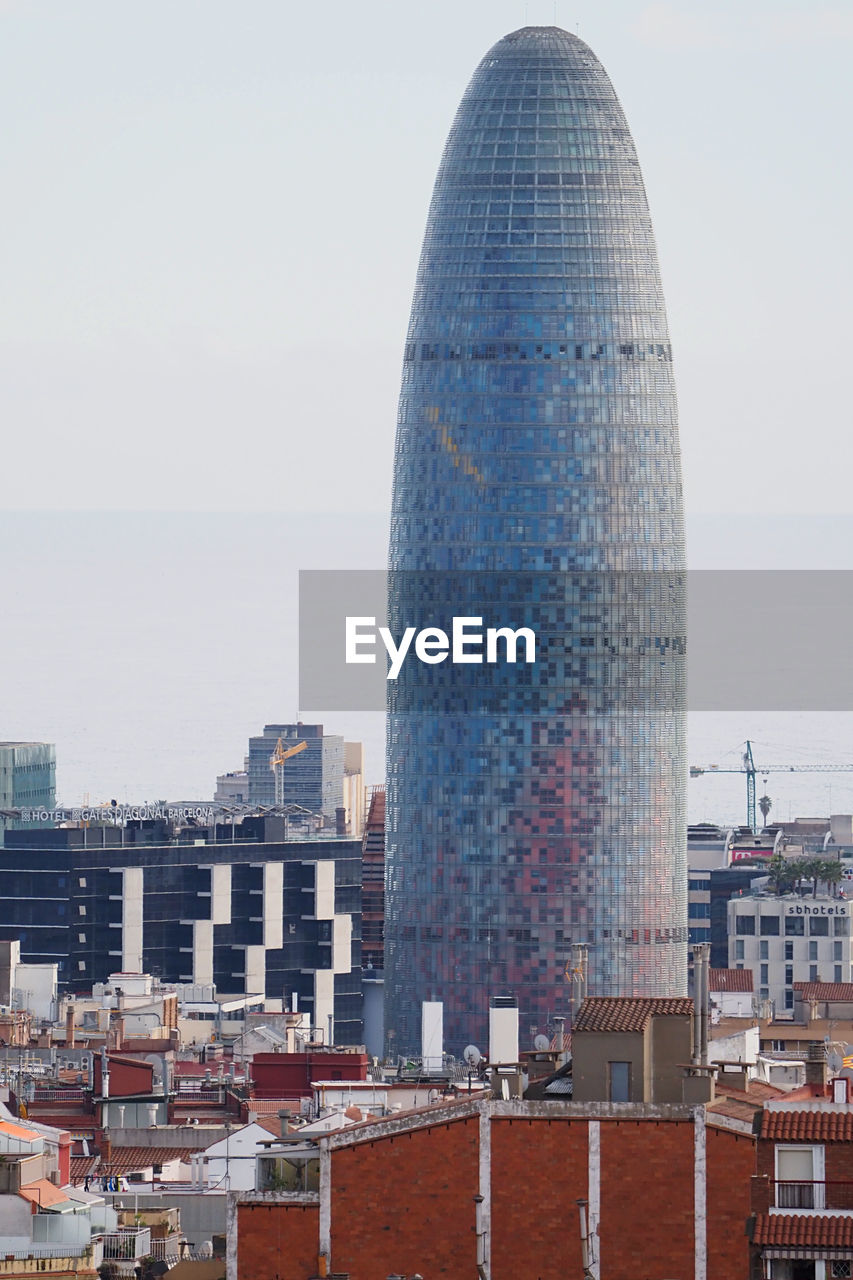 MODERN BUILDINGS AGAINST SKY