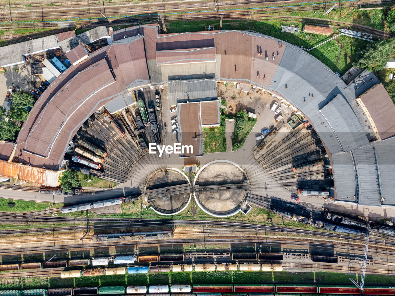 Aerial photo of semicircular railway depot. near round railway turntable for turning wagons.
