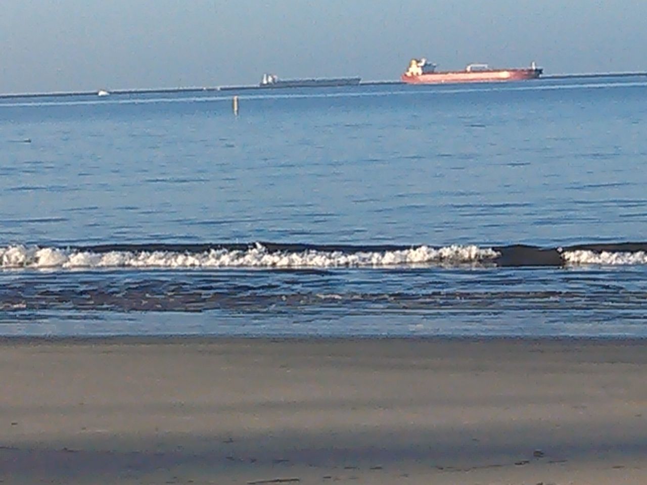 VIEW OF BOATS IN SEA