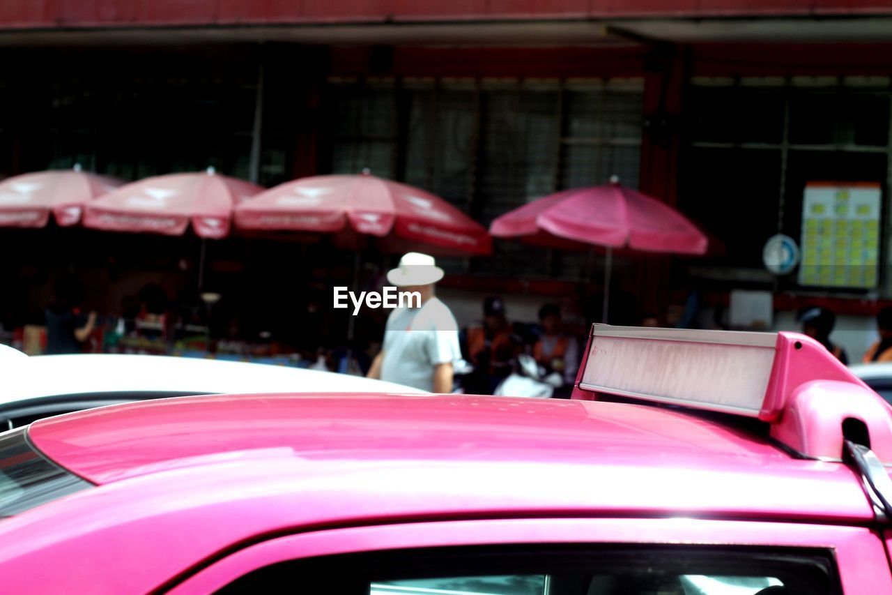 REAR VIEW OF MAN IN BUS