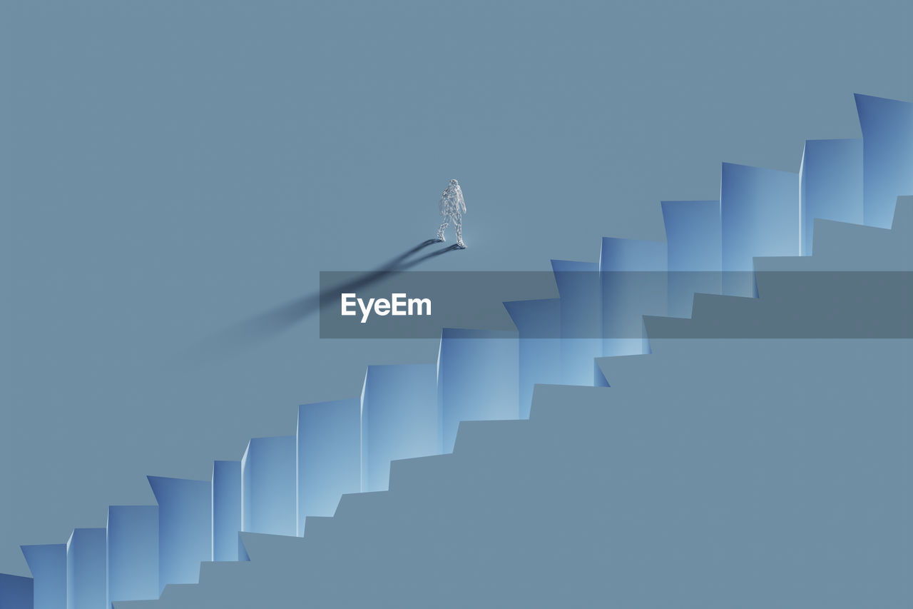 Three dimensional render of wireframe man walking toward crevice