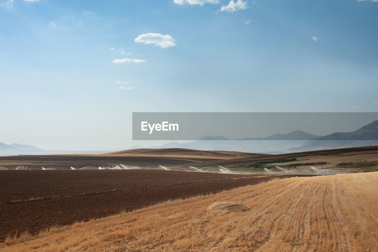 SCENIC VIEW OF ROAD BY LAND AGAINST SKY