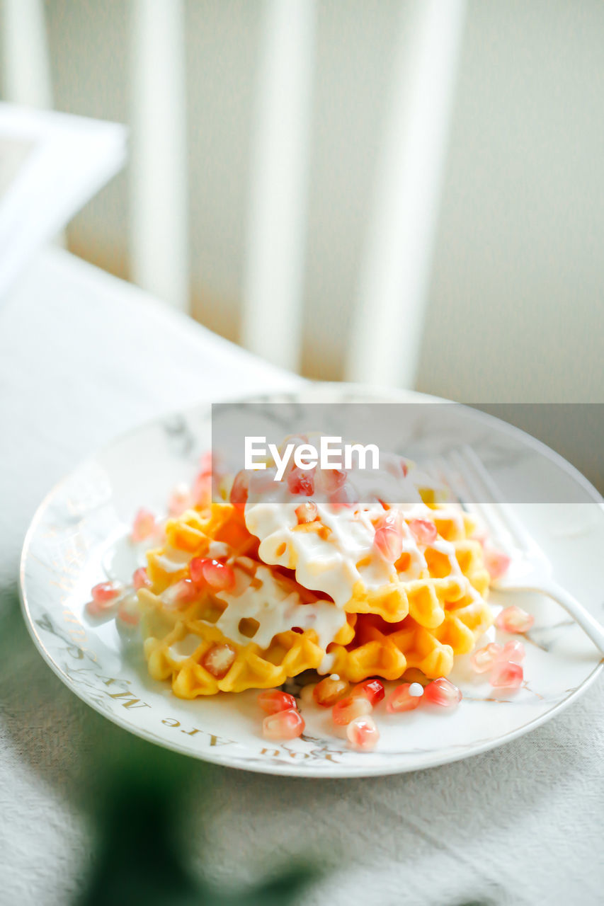 Close-up of cake in plate on table