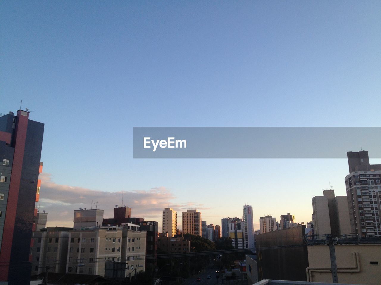 VIEW OF CITYSCAPE AGAINST CLEAR SKY