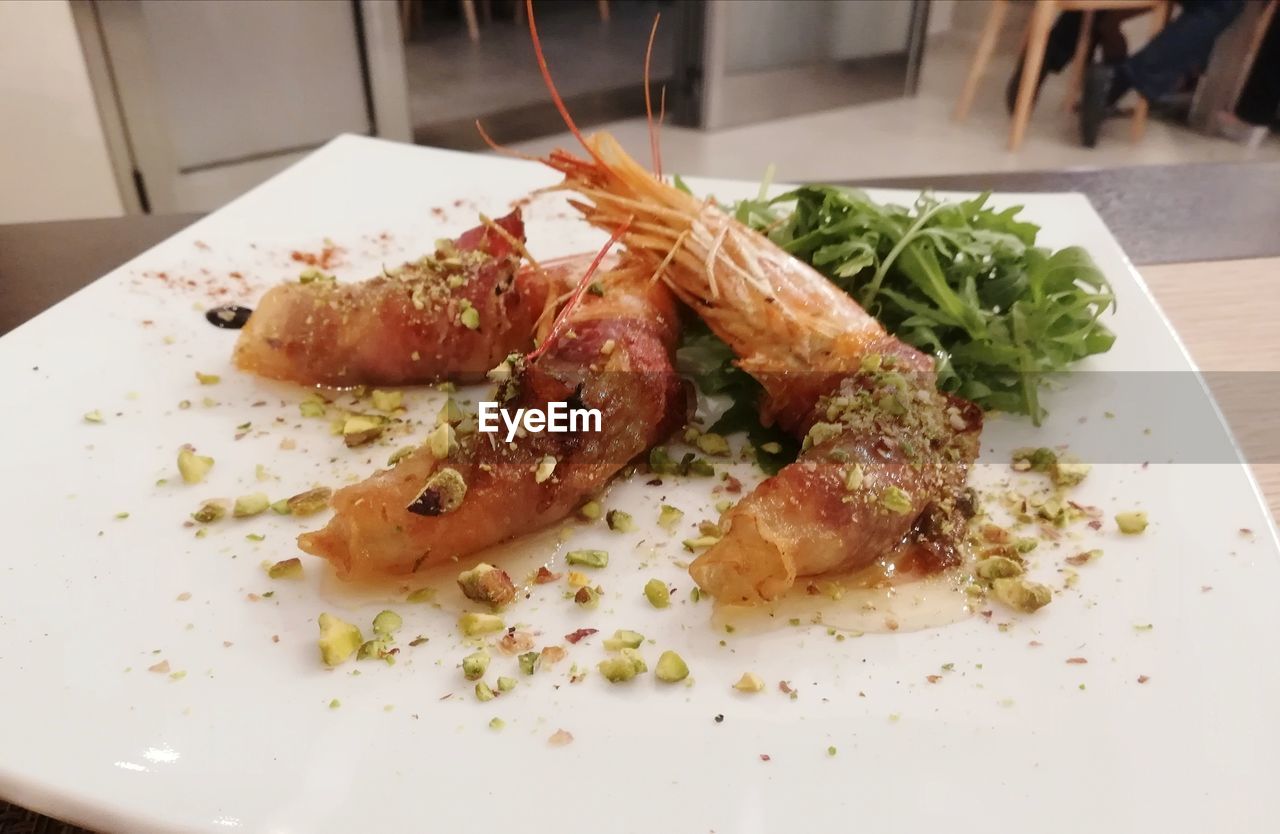 HIGH ANGLE VIEW OF FOOD SERVED IN PLATE