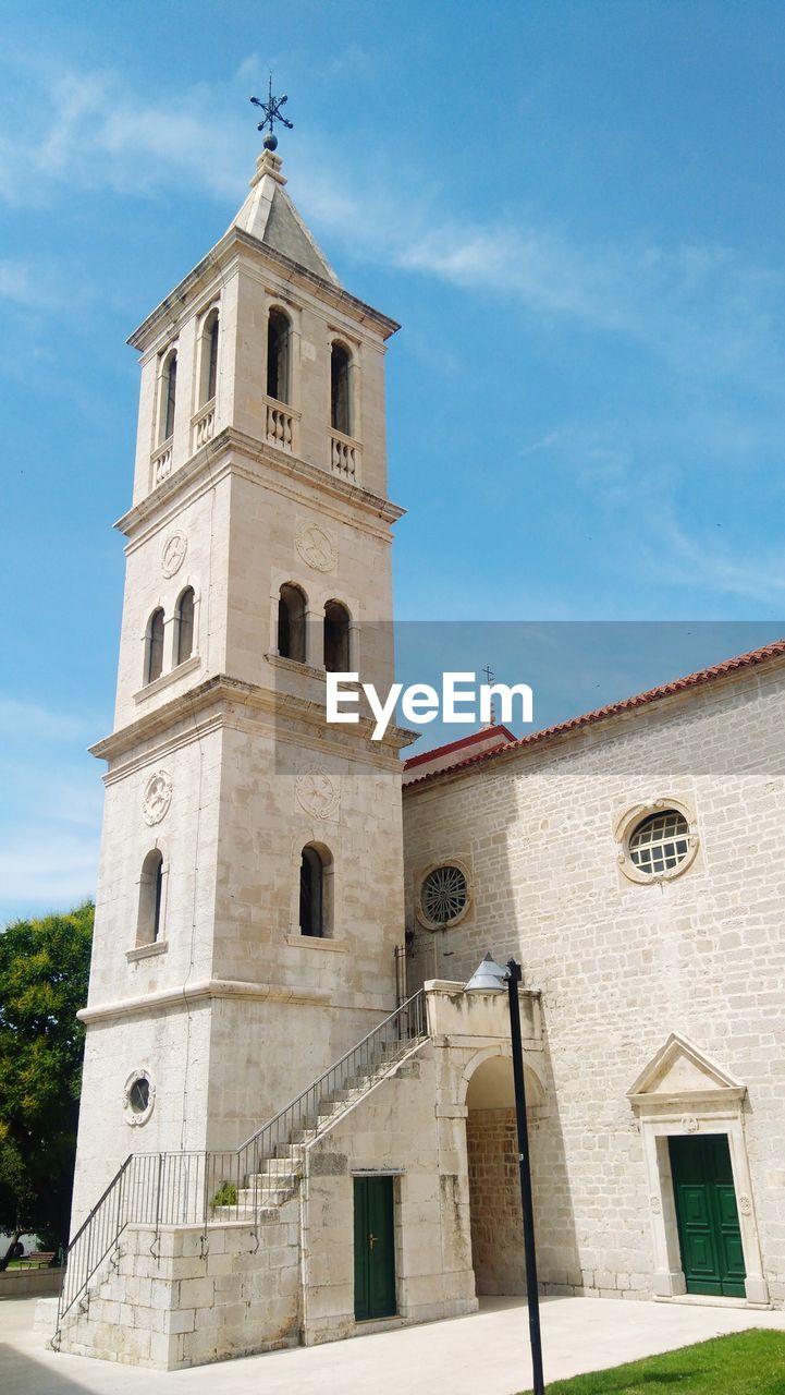 Low angle view of historic building against sky