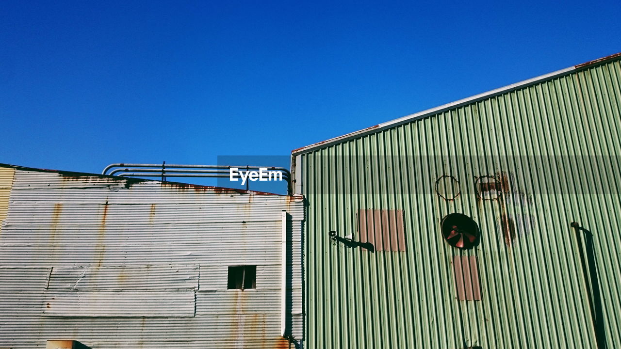 Metal structure against clear blue sky