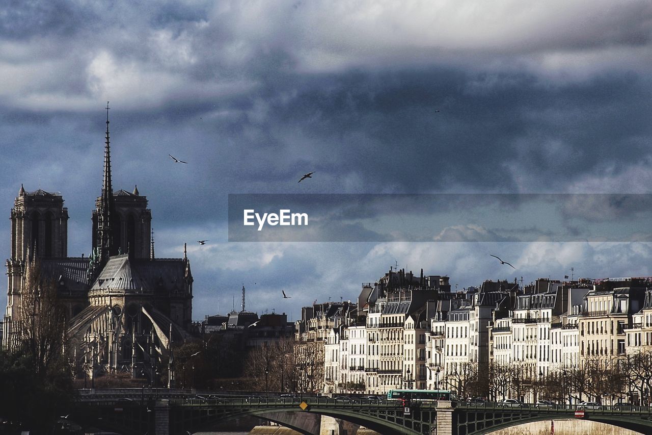 VIEW OF CLOUDY SKY OVER CITY