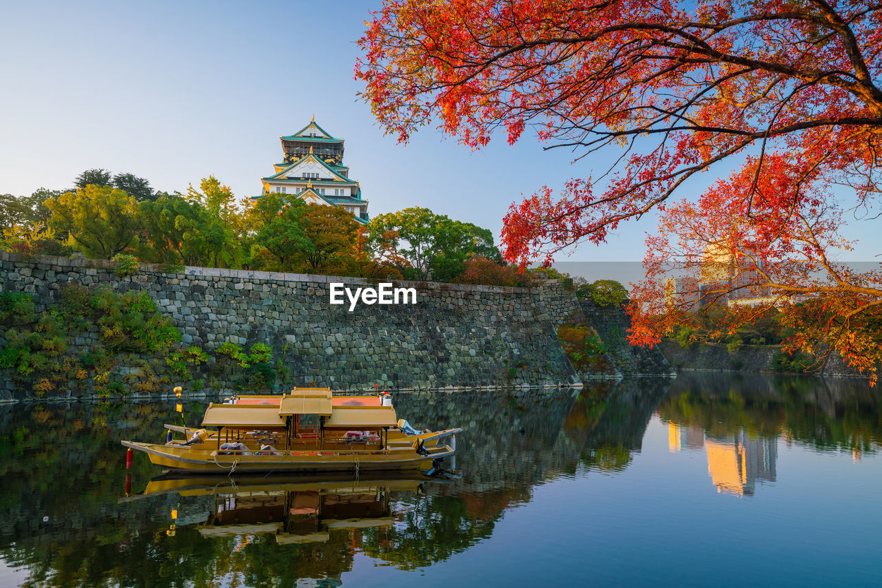 scenic view of lake against clear sky during autumn