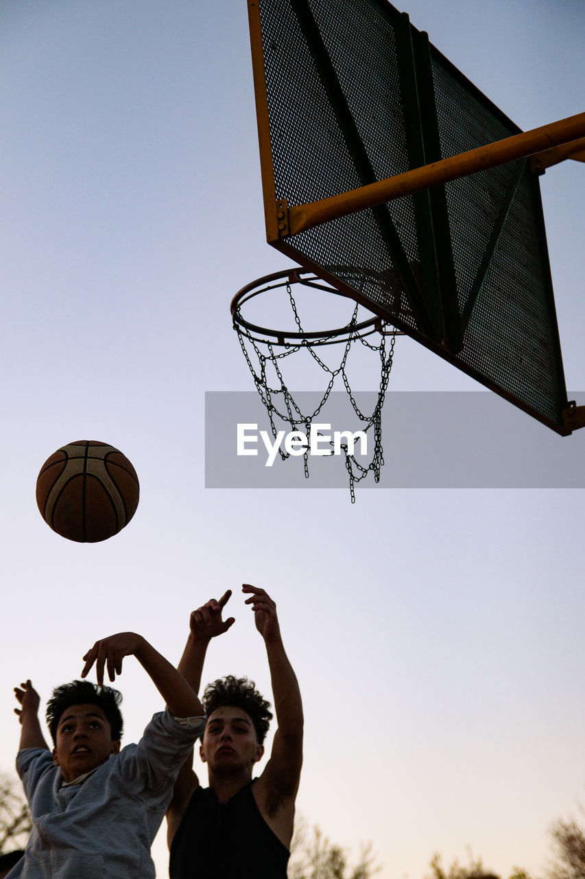 Street basketball players jumping