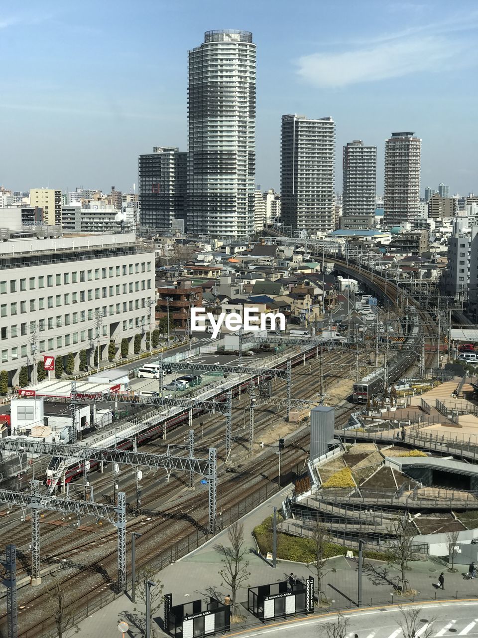 High angle view of buildings in city against sky