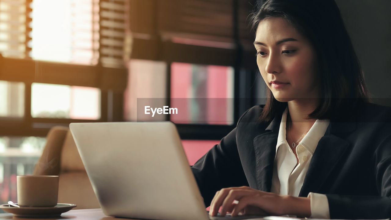 Woman working with laptop