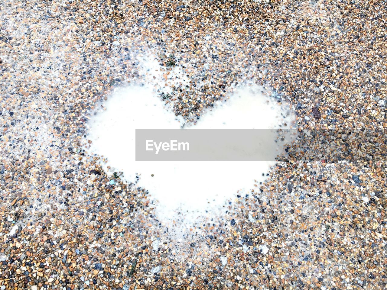 CLOSE-UP OF HEART SHAPE MADE OF STONE WALL
