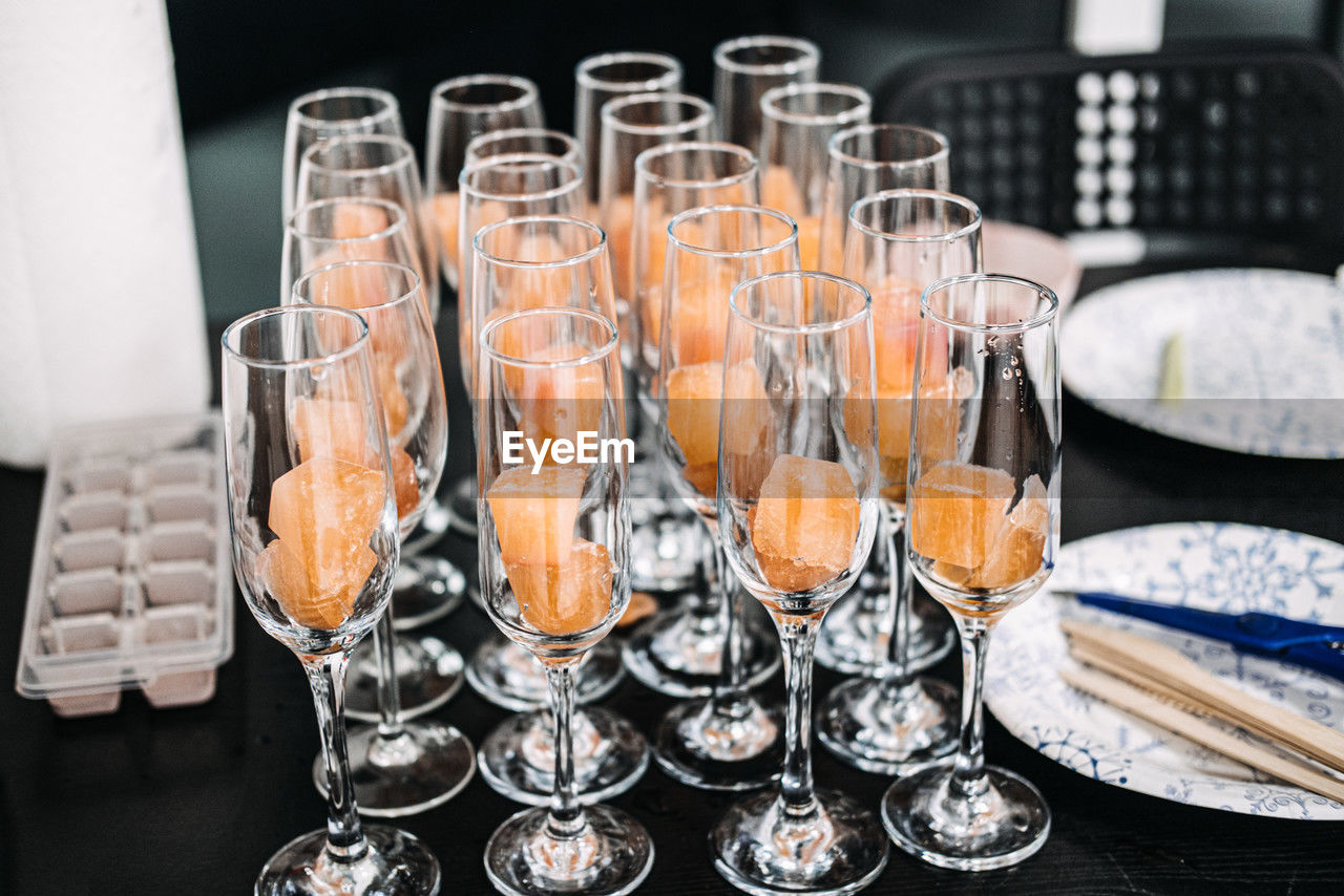 Elegant champagne glasses with sorbet for catering event. rows of champagne 