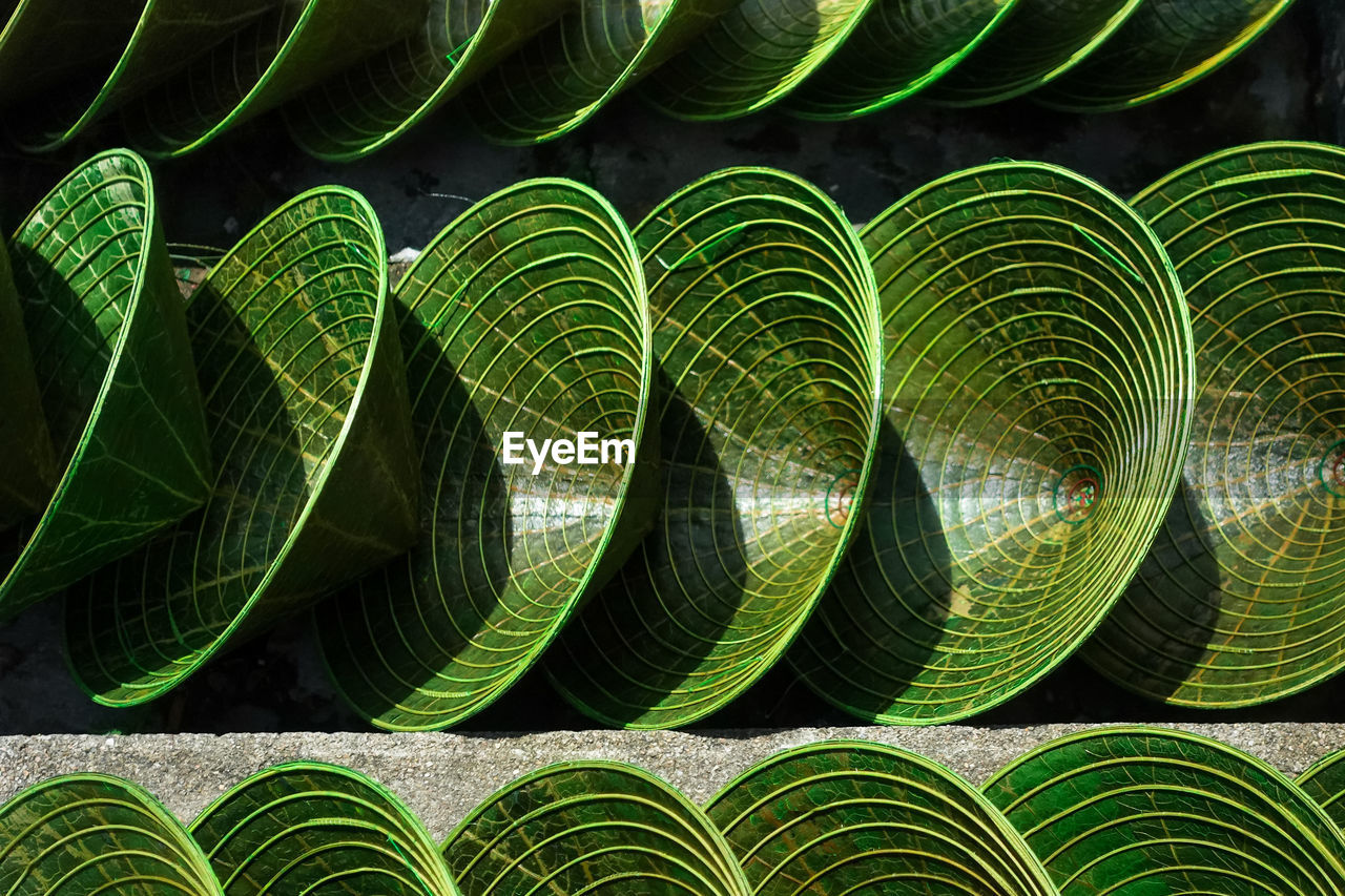 green, leaf, no people, pattern, full frame, circle, backgrounds, in a row, grass, flower, plant part, plant, yellow, line, macro photography, nature, large group of objects, repetition, outdoors, abundance, close-up