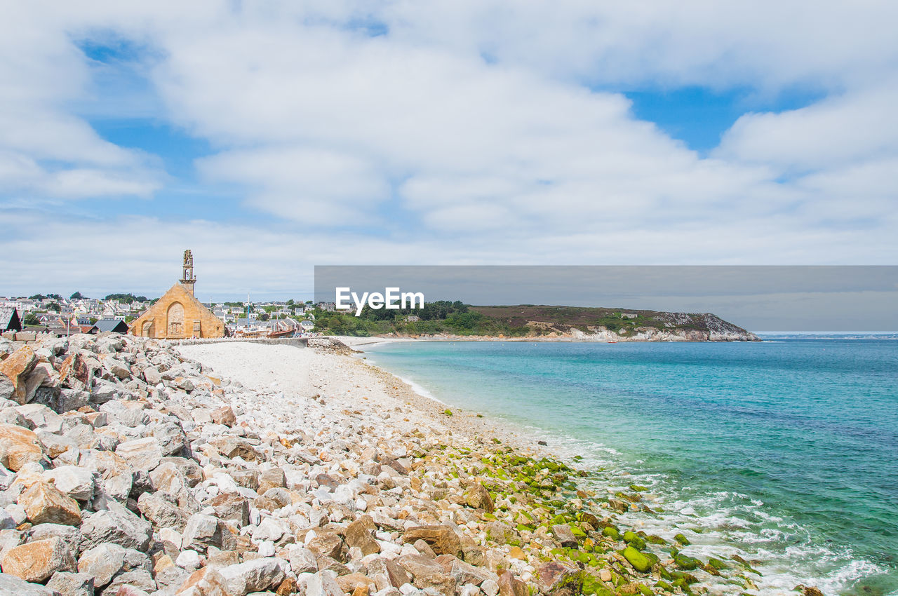 PANORAMIC VIEW OF SEA AGAINST CLOUDY SKY