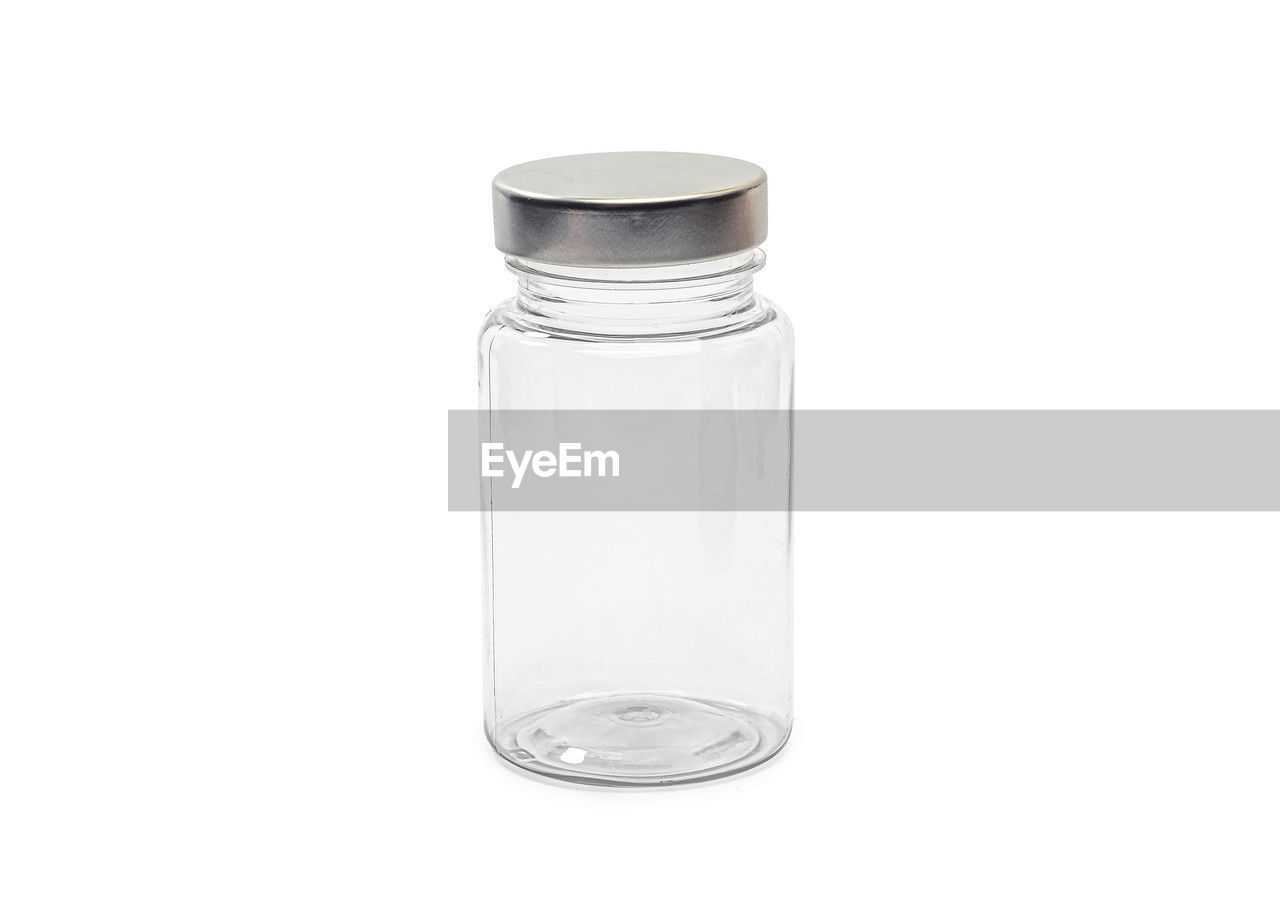 white background, cut out, bottle, container, drinkware, glass bottle, studio shot, glass, tableware, indoors, white, plastic bottle, food and drink, single object, copy space, no people, transparent, jar, salt - seasoning, healthcare and medicine