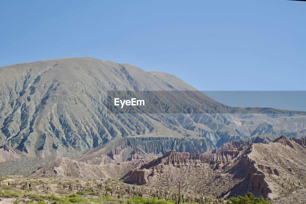 Scenic view of mountains against clear sky