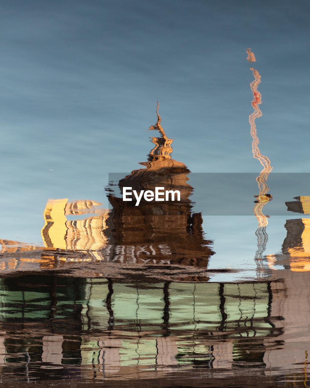 Reflection of the city of glasgow in the river clyde